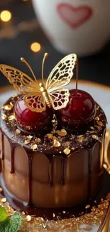 Chocolate dessert with golden butterfly and cherries.