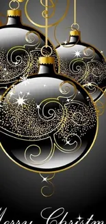 Elegant Christmas baubles with gold swirls on a black background.