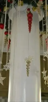 Holiday-themed ceiling with red ornaments and garlands.