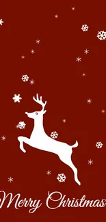 Red background wallpaper with white Christmas deer and 'Merry Christmas' text.