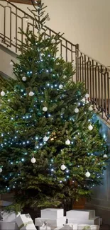 Elegant hotel scene with Christmas tree and staircase.