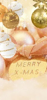 Pastel Christmas ornaments with Merry X-Mas tag on snow.