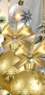 Elegant Christmas ornaments with golden bows and snowflakes.