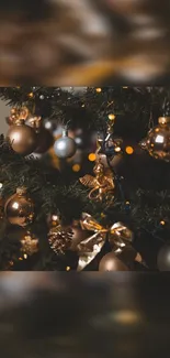 Elegant Christmas tree with gold and bronze ornaments.