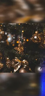 Elegant golden decorations on a Christmas tree with warm festive lights.