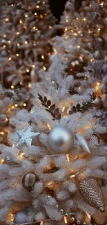 Snowy Christmas tree with lights and ornaments creating a cozy holiday atmosphere.