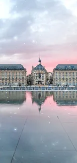 Classical architecture reflecting in calm water at sunset.