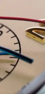 Close-up image of an elegant clock face with gold and blue details.