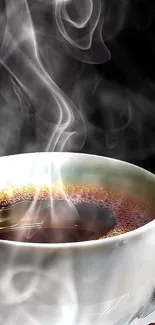 Steaming coffee cup with steam on a dark background, perfect for phone wallpaper.