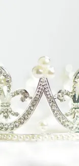 Elegant crown with pearls wallpaper for mobile.