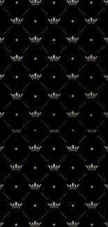 Elegant black wallpaper with gold crowns pattern.