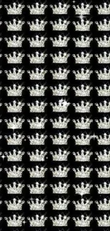 Seamless crown pattern on a black background wallpaper.