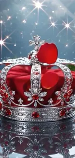Silver crown with red jewels and roses on starry background.
