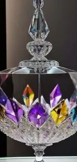 Ornate crystal with colorful jewel accents on display.