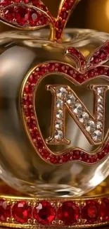 Luxurious crystal apple with red gemstones.