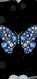 Elegant wallpaper with crystal butterfly and heart on a black background.