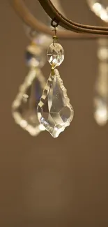 Elegant chandelier with crystal drops, close-up view.