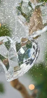 Crystal heart ornaments with a blurred green background.