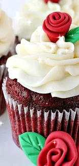 Red velvet cupcakes with rose decorations.