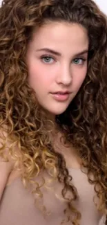 Portrait of a woman with elegant curly hair, exuding grace and natural beauty.