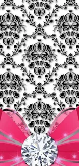 Elegant damask wallpaper with pink bow and diamond accent.