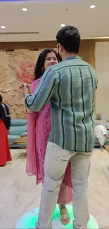 Couple dancing elegantly at a social event.