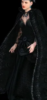 Elegant fantasy woman in a black gown with cape.