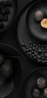 Elegant dark wallpaper with fruits on black plates.