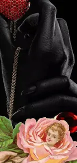 Dark hand holding a heart pendant with floral art