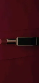 Dark red wallpaper with lipstick design.