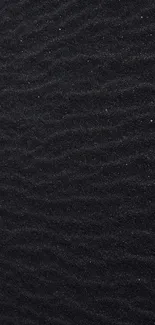 Black sand texture mobile wallpaper for a sleek background.