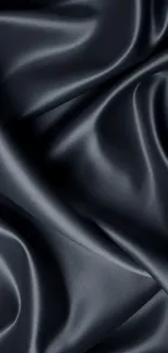 Dark silk texture wallpaper with smooth flowing folds.