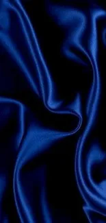 Elegant blue silk texture with soft, luxurious folds for mobile wallpaper.