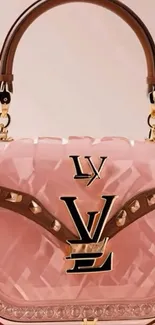 Stylish pink designer handbag with gold accents.