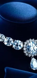 A stunning diamond necklace elegantly displayed on dark fabric.