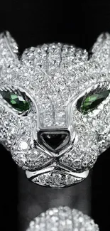 Elegant diamond panther with green eyes on a silver background.