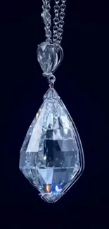 Elegant diamond pendant against deep blue backdrop, ideal mobile wallpaper.