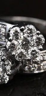 Close-up of elegant diamond ring on dark background.