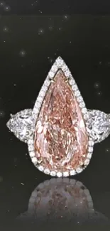 Elegant pear-shaped pink diamond ring with side stones on black background.