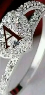 Close-up of an elegant diamond ring with intricate crystal design.