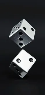 Metallic dice floating on black background wallpaper.