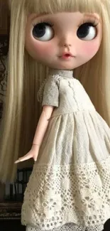 Elegant doll with lace dress in vintage style.