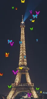 Eiffel Tower illuminated at night with deep blue sky backdrop.