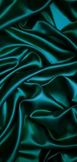 Emerald green satin texture with elegant folds for mobile wallpaper.