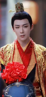 Emperor in ornate red and gold robes with a crown.