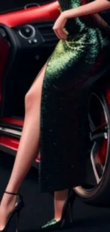 Elegant woman in a shimmering dress by a crimson car.