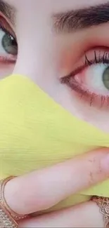 Close-up of captivating eyes with a yellow veil