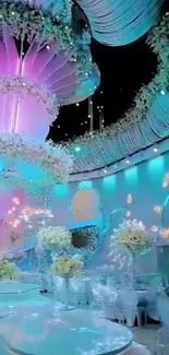 Elegant fantasy wedding decor with teal and pink lighting.