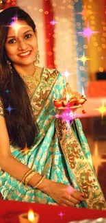 Woman in turquoise saree with festive lights and decor.