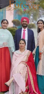 Elegant family portrait in vibrant festive attire.